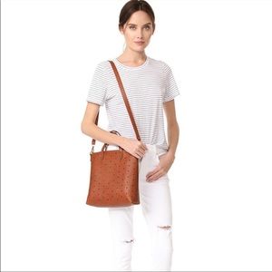 The Transport Crossbody Bag: Geo Holepunch Edition